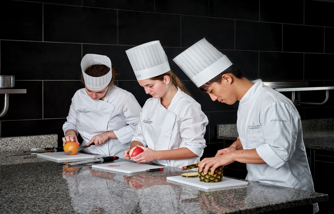 students studying at culinary school